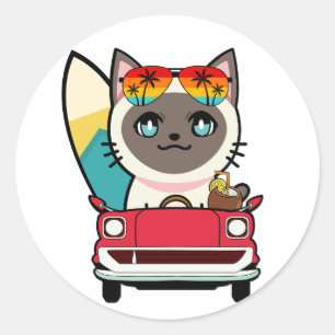 Funny siamese cat is driving to the beach classic round sticker