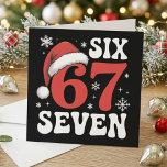 Funny Six Seven Santa Hat Christmas Saying Holiday Card<br><div class="desc">This festive typography design features the funny “six seven” phrase with a Santa hat and winter snowflakes on a dark background. The bold red and white lettering gives it a playful holiday look that stands out for Christmas humour and seasonal meme-style designs. A fun choice for anyone who likes number...</div>