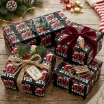 Funny Six Seven Santa Hat Christmas Saying Wrapping Paper<br><div class="desc">This playful holiday design features the phrase “Six Seven” with a bold red 67, Santa hats, and scattered snowflakes on a black background. The festive typography gives the artwork a fun, eye-catching look with strong seasonal contrast. It works well for anyone who enjoys humourous Christmas sayings and graphic holiday designs....</div>