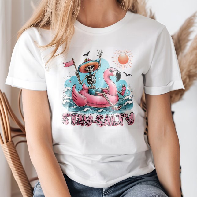 Funny Skeleton "Stay Salty" Summer Beach T-Shirt (Young blond woman wearing a Funny Skeleton "Stay Salty" Summer Beach T-Shirt)