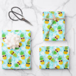 Funny Tropical Christmas Pineapples Wrapping Paper Sheet<br><div class="desc">Funny, tropical Christmas pineapples wearing sunglasses and festively decorated with Christmas lights, ornaments and candy canes. This pattern has a pastel blue background with Hawaiian hibiscus flowers. Available here on a custom three sheet set of wrapping paper. Change the size of the pattern to your preference on each sheet if...</div>