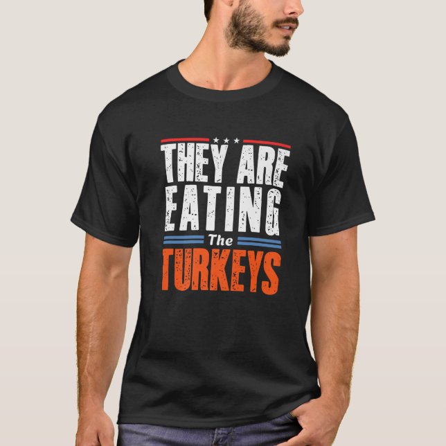 Funny Trump Saying They are Eating The Turkeys Pre T-Shirt (Front)