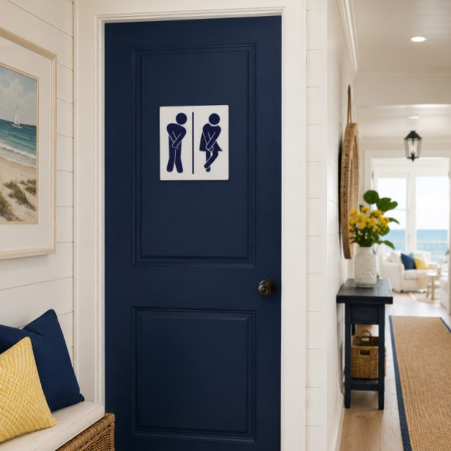 Funny Unisex Bathroom Sign (Funny navy restroom sign displayed on a coastal bathroom door with bright seaside decor.)