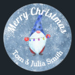 Funny Watercolor Christmas Gnome Classic Round Sticker<br><div class="desc">Be unique and send Holiday Greetings with Gnomes! This design features watercolor snowflakes and a cute gnome holding Christmas lights. Add your message and make someone smile when they receive this funky sticker with your holiday greeting or gift. Part of our "Holiday Gnomes' collection.</div>