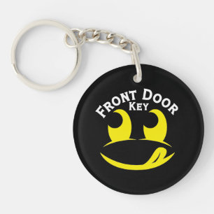 Funny Yellow Smiley Face with Tongue Out on Black Key Ring