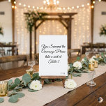 Funny "You Survived the Ceremony" Minimalist Weddi Table Number<br><div class="desc">Add a touch of humor to your wedding reception with this witty table number card! Featuring the playful phrase "You Survived the Ceremony! Please take a seat at, " this minimalist design uses elegant black script calligraphy on a crisp white background. It's the perfect icebreaker for your guests. Easily personalize...</div>