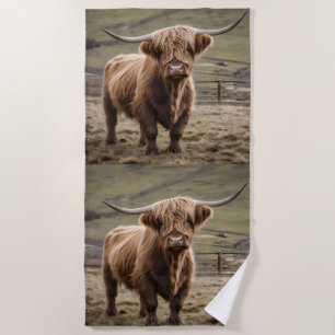 **"Furry Majesty: The Woolly Brown Highland Cow"** Beach Towel