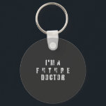 Future Doctor Grunge Typography Design Key Ring<br><div class="desc">Bold and edgy, this design features the phrase “I’m a Future Doctor” in a distressed, grunge-style font against a dark background. The worn texture adds a strong, rebellious vibe while celebrating ambition and dedication. Perfect for medical students and future healthcare professionals who want to showcase their journey with confidence and...</div>