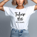 Future Mrs Black Script Custom Last Name Wedding T-Shirt<br><div class="desc">Modern wedding "Future Mrs" custom shirt design for the bride features a modern black and white colour scheme with bold and playful handwritten calligraphy script typography with stylish scroll details. Personalise the casual yet elegant custom text her new / future married last name.</div>