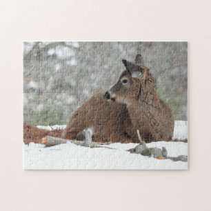 Fuzzy White Tailed Deer Fawn resting in snow Jigsaw Puzzle