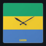 Gabon National Flag Patriotic Square Wall Clock<br><div class="desc">Gabon National Flag Patriotic Square Wall Clock with the country flag in the national colors printed all over the clock. Country name is subtly integrated in the design on the bottom. Text is fully customizable using "Customize it!" feature. This charming design is the stunning gift and the great show piece...</div>