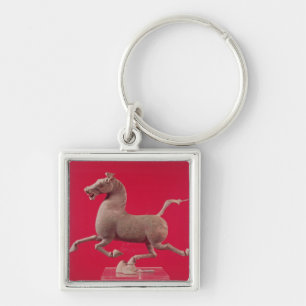 Galloping horse with one Hoof Resting on a Key Ring