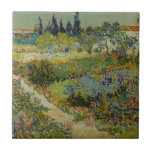 Garden at Arles by Vincent Van Gogh Tile<br><div class="desc">Garden at Arles by Vincent Van Gogh, oil on canvas 1888, is a landscape painting of a small footpath through a sprawling garden of flower beds under a sunny sky, with fruit trees, shrubbery, cypresses and rural French buildings in the background. With varied brushstrokes that convey the form, growth and...</div>