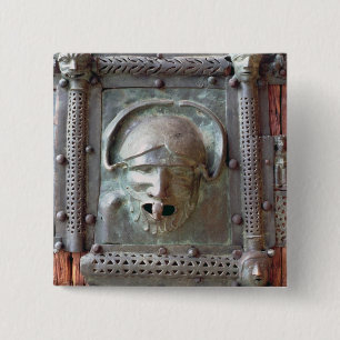 Gargoyle panel from the left door of the portal, 1 15 cm square badge