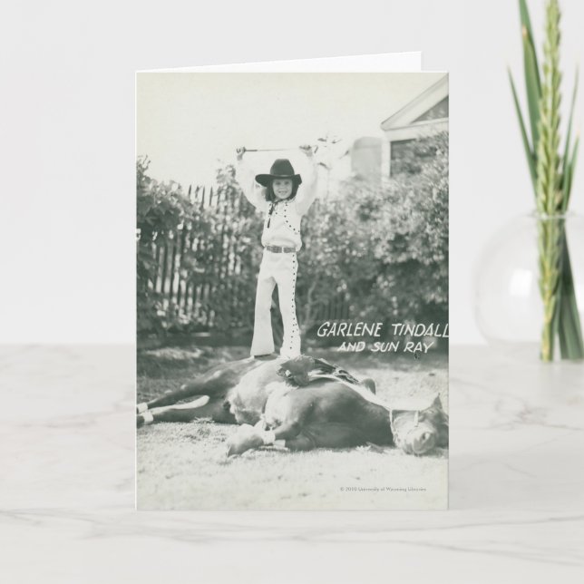 Garlene Tindall standing on a trick horse. Card (Front)