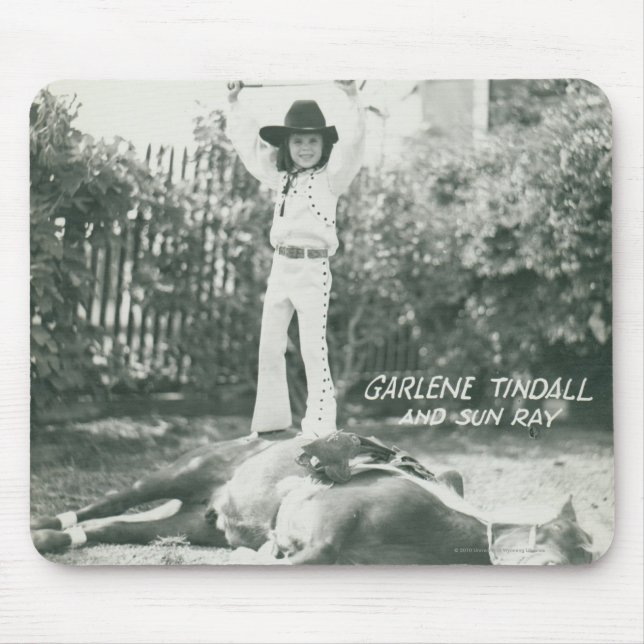 Garlene Tindall standing on a trick horse. Mouse Pad (Front)
