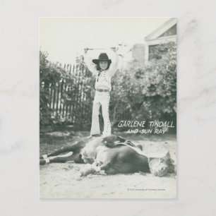 Garlene Tindall standing on a trick horse. Postcard