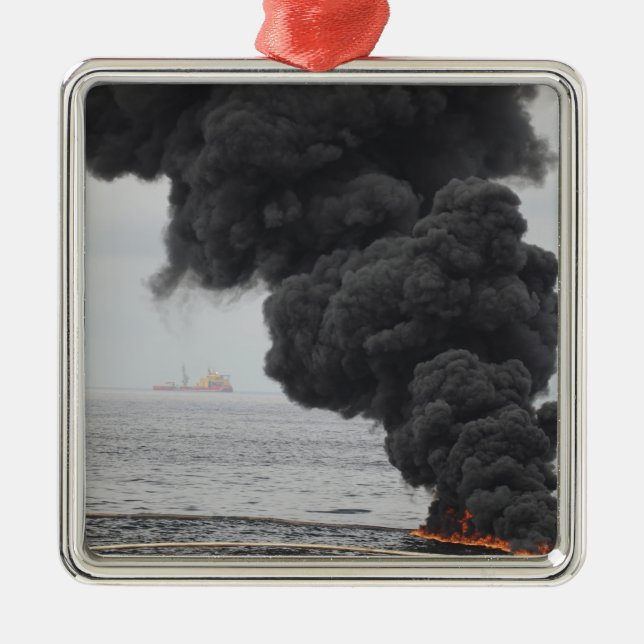 Gathered concentrated oil burns metal tree decoration (Front)