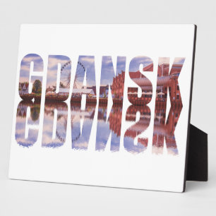 Gdansk text with old town view with reflection plaque