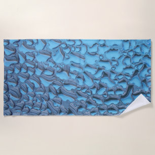 Gentle raindrops on blue glass beach towel