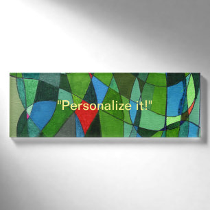 Gently curved mostly green with red accents name tag