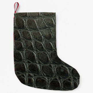 Genuine black alligator leather texture, close up  small christmas stocking