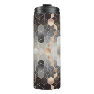 Geometric abstraction of hexagons on a black and w thermal tumbler