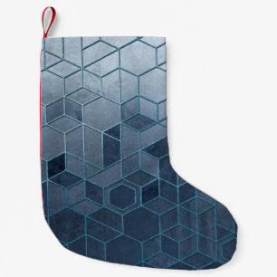 Geometric abstraction of hexagons on a blue relief small christmas stocking
