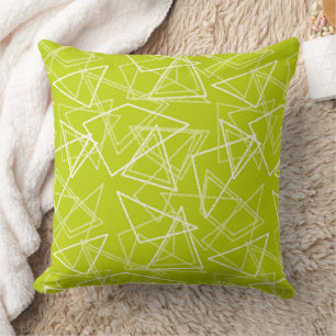 Geometric drawing with white chalk shapes green cushion