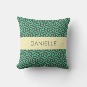 geometric green and yellow motif cushion