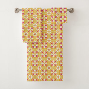 geometric pattern in yellow, pink, and orange bath towel set