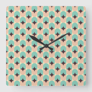 Geometric pattern of teal, beige, and black shapes square wall clock
