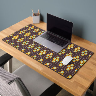 Geometric pattern with orange and blue hexagons desk mat