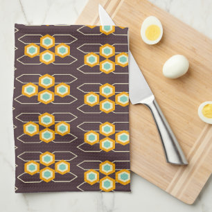 Geometric pattern with orange and blue hexagons tea towel