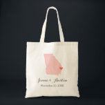 Georgia Wedding Welcome Tote Bag<br><div class="desc">Welcome out of town wedding guests with a bag full of snacks and treats personalised with the state where you're getting married and the bride and groom's names and wedding date. Click Customise It to move the heart to show any city or location on the state map. Use the design...</div>
