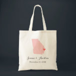 Georgia Wedding Welcome Tote Bag<br><div class="desc">Welcome out of town wedding guests with a bag full of snacks and treats personalised with the state where you're getting married and the bride and groom's names and wedding date. Click Customise It to move the heart to show any city or location on the state map. Use the design...</div>