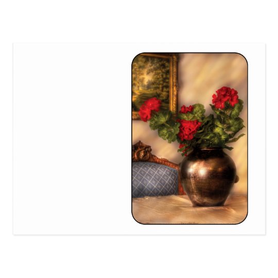 Geraniums on a table postcard