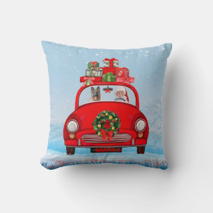 German Shepherd Dog In Car With Santa Claus Cushion
