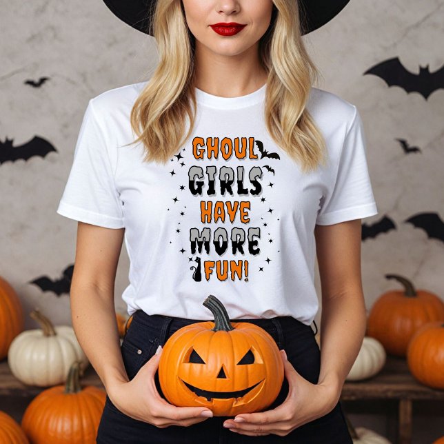 Ghoul Girls Have More Fun Modern Halloween T-Shirt (Women in a white Ghoul Girls have more fun shirt with Halloween decor.)