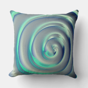Giant silver and aquamarine spiral over blue cushion