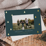 Gilded Forest | Elegant Christmas Photo Foil Holiday Card<br><div class="desc">A modern and elegant Christmas holiday card design featuring a horizontal photo on a deep spruce green background dotted with gold foil pine trees. Personalise with your custom holiday greeting,  family name and the year beneath.</div>