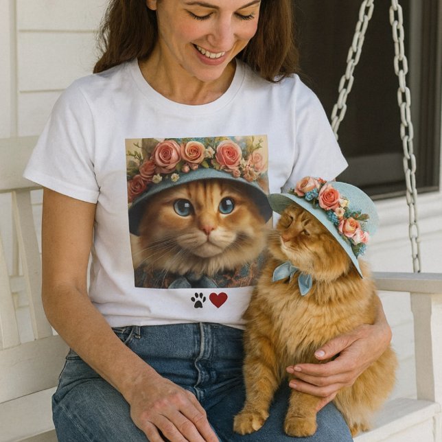 Ginger Cat in Blue Hat with Flowers  Cat Lover  T-Shirt ( a warm, spring‑fresh porch moment with the lady on her swing, petting her cat . Pet lovers  t-shirt)