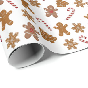 gingerbread cookies and candy canes on white wrapping paper