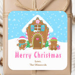 Gingerbread House Blue and Pink Merry Christmas Square Sticker<br><div class="desc">This cute and festive Merry Christmas sticker can be personalised with a name, relation or title. It features a cute gingerbread house decorated with pink and green candy. Beside it are adorable gingerbread men with gifts, dressed in Santa hats and a scarf. In the background is a bright blue winter...</div>