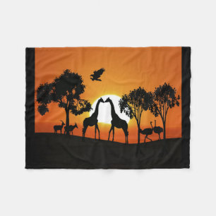 Giraffe at sunset fleece blanket