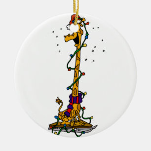 Giraffe in lights on sled ceramic ornament