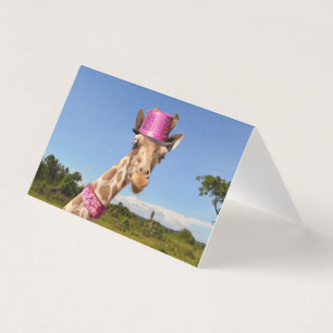 Giraffe in sparkly pink hat