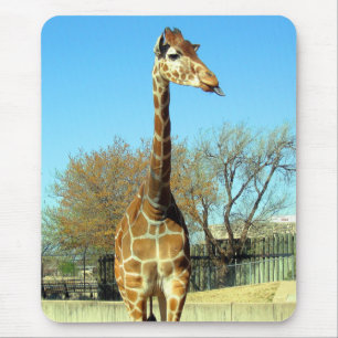 GIRAFFE STICKING IT'S TONGUE OUT MOUSE PAD