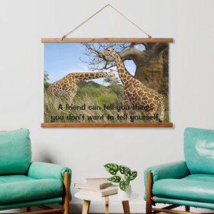 Giraffes out in the field by some trees  hanging tapestry