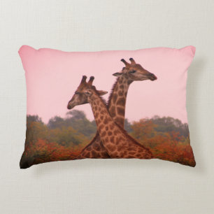 Giraffes with a pink sky  decorative cushion
